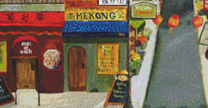 Bank Street counted cross stitch pattern by Gwendolyn McShepard/Ansada Art Licensing Group, LLC